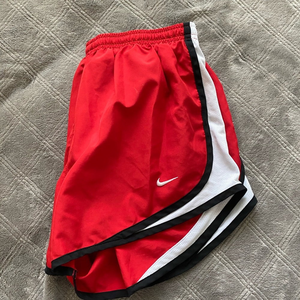 red nike shorts